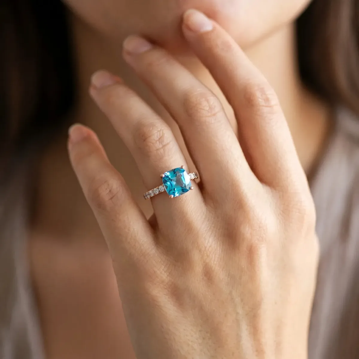 Cushion Cut Blue Topaz Solitaire Ring with Round Pavé Band and Four-Prong Setting Rose gold