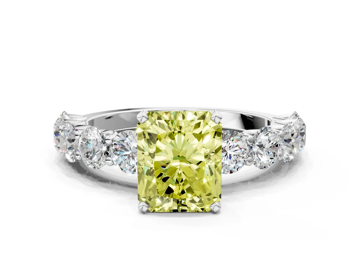 Fancy Yellow Radiant Cut Diamond Prong Setting with Side Stones on a Pave Band Silver