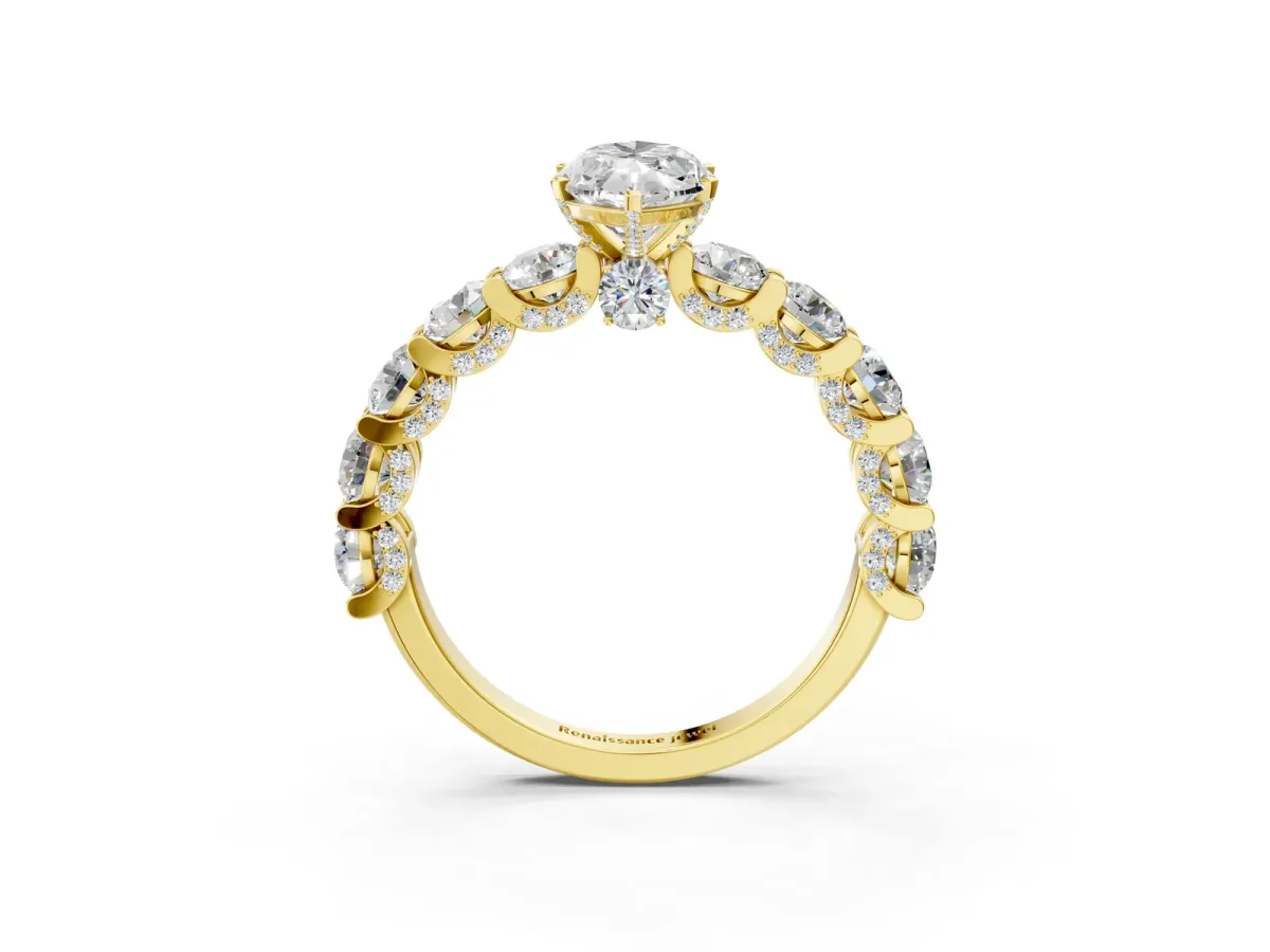 Marquise Cut Diamond Side Stone Engagement Ring with Four-Prong Setting Yellow gold