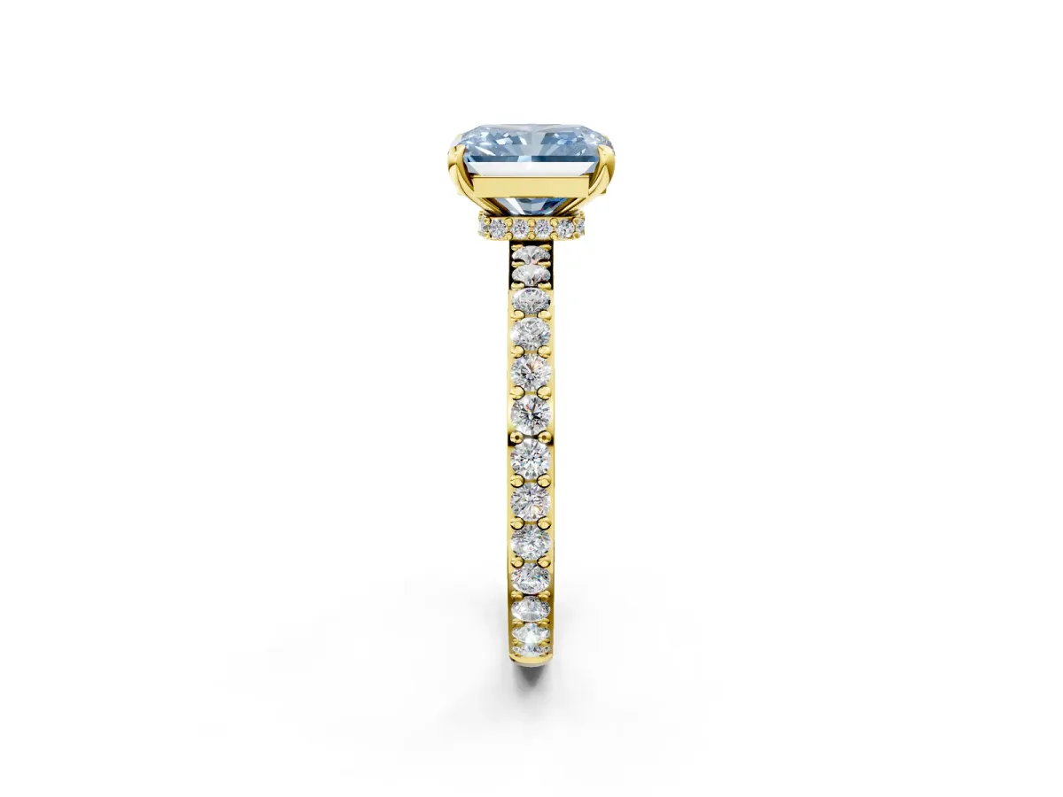 Fancy Blue Radiant Cut Diamond Solitaire Engagement Ring with Pavé Band and Four-Prong Setting Yellow gold