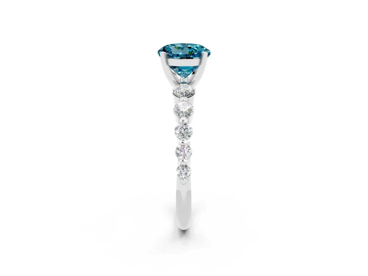 Round Cut Solitaire Blue Topaz Ring with Pave Band and Four-Prong Setting Silver