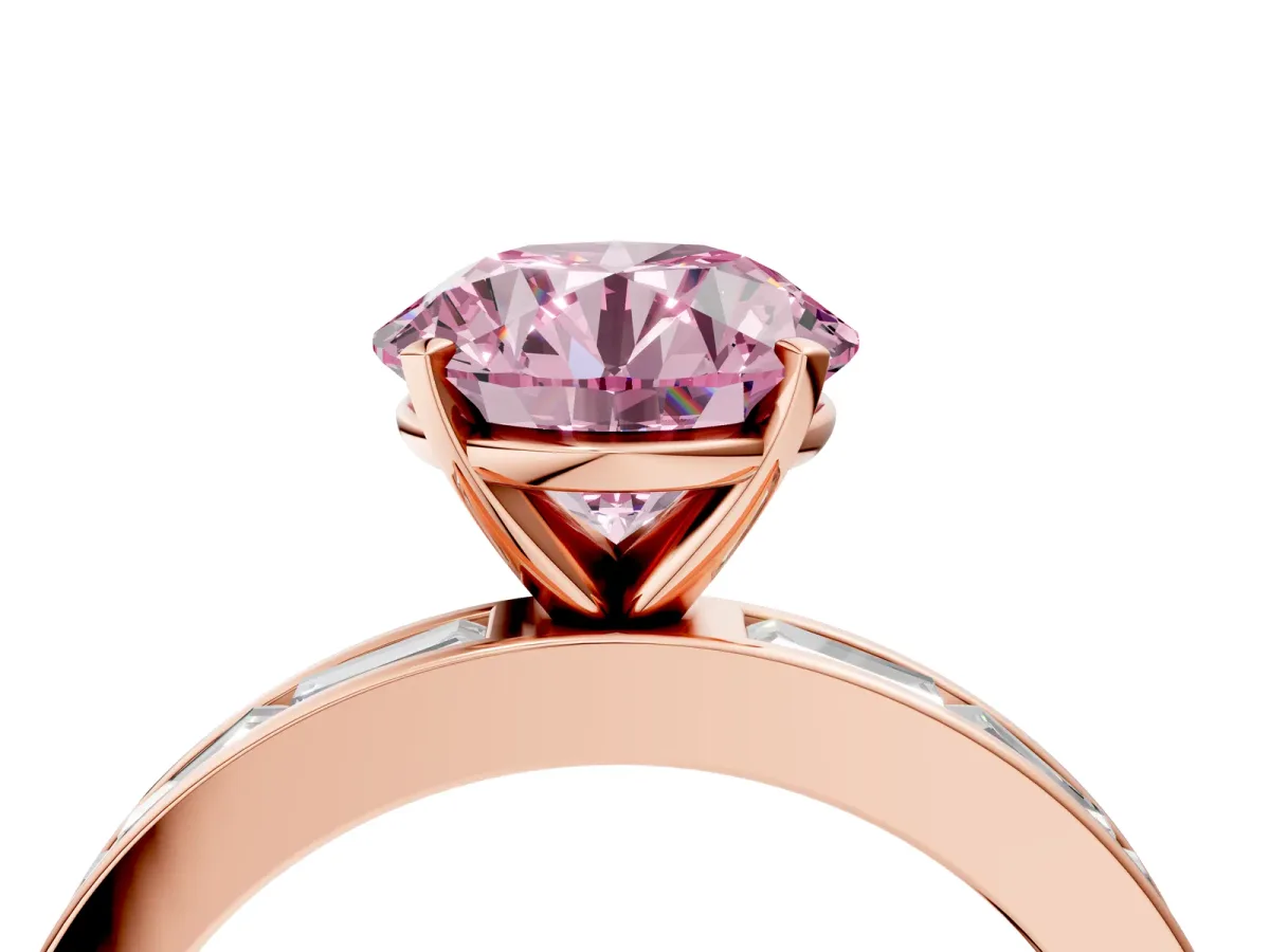 Fancy Pink Round Cut Solitaire Diamond Ring with Channel-Set Baguette Band and Four-Prong Setting Rose gold