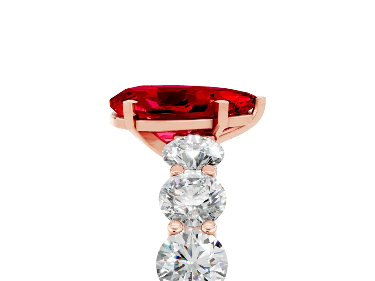Pear Cut Ruby Prong Setting with Side Stones on a Pave Band Rose gold