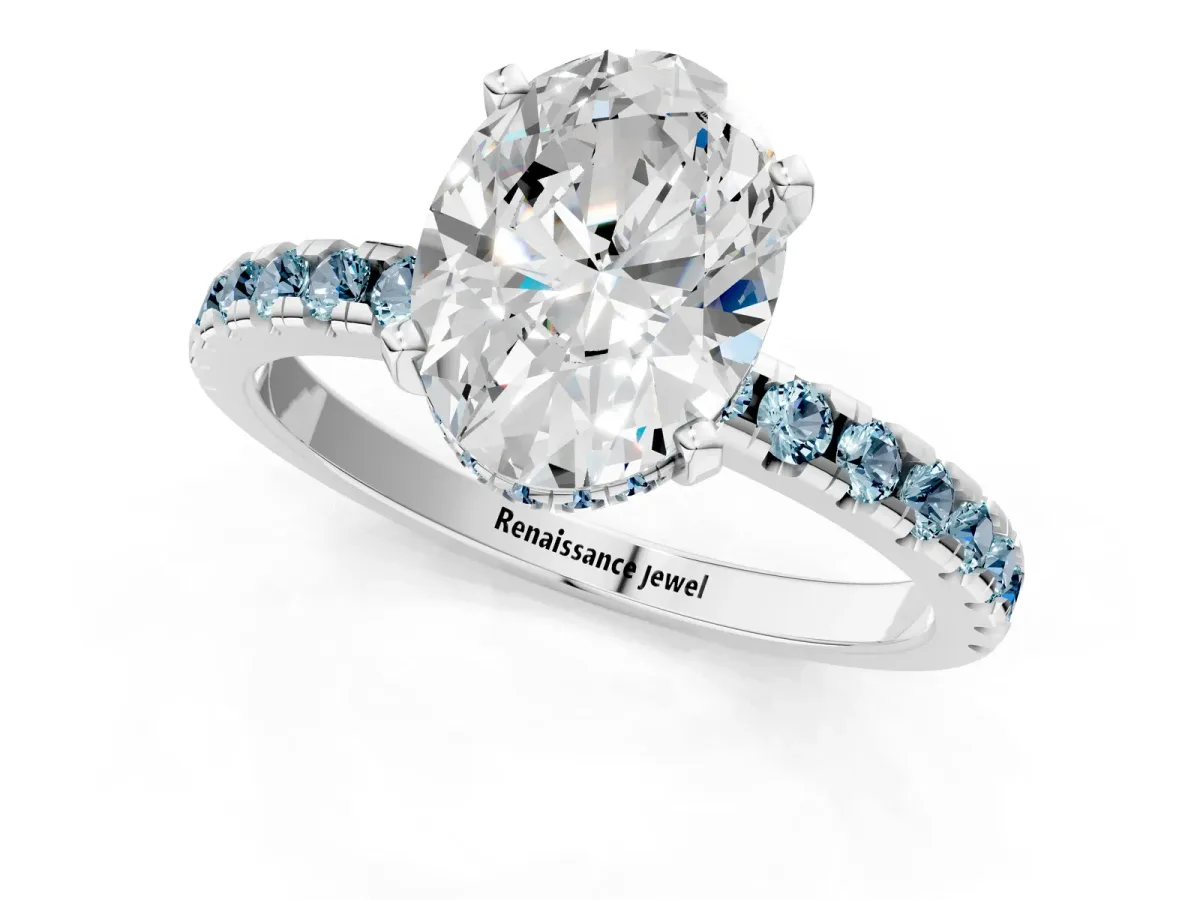 Oval Cut Diamond Solitaire Ring with Round Aquamarine Pavé Band and Four-Prong Setting White gold