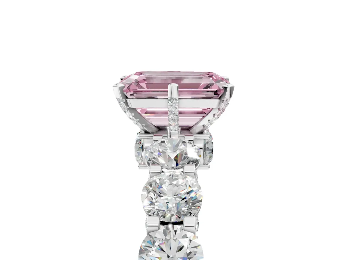 Fancy Pink Emerald Cut Diamond Side Stone Engagement Ring with Four-Prong Setting Platinum