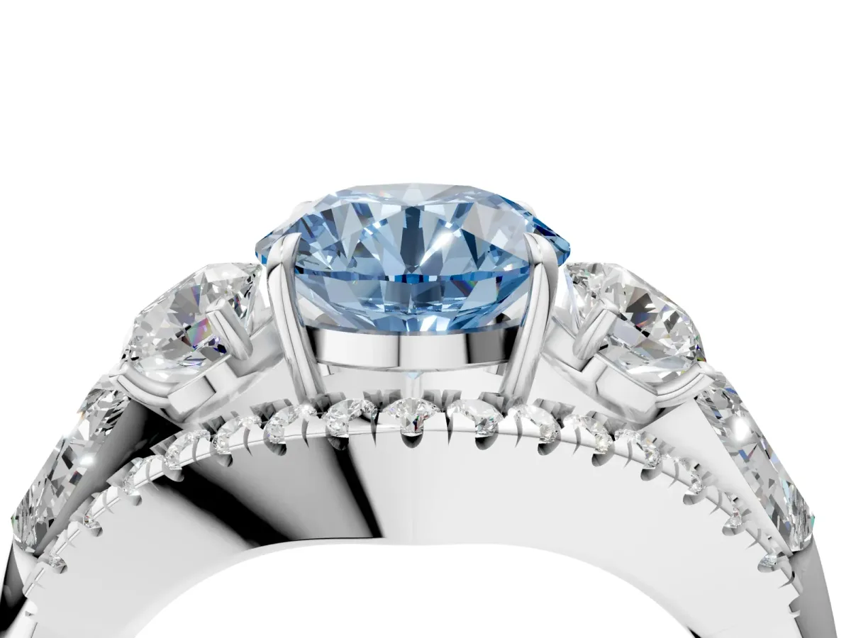 Fancy Blue Three-Stone Round Cut Diamond Engagement Ring with Pave Band and Prong Setting Platinum