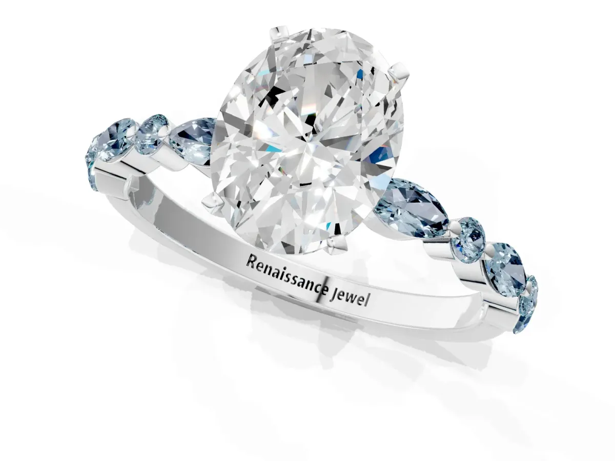 Oval Cut Diamond Ring with Marquise and Round Aquamarine Side Stones and Four-Prong Setting White gold