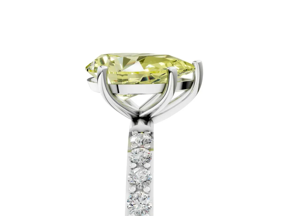 Fancy Yellow Pear Cut Diamond Solitaire Ring with Round Pavé Shoulders and Prong Setting White gold