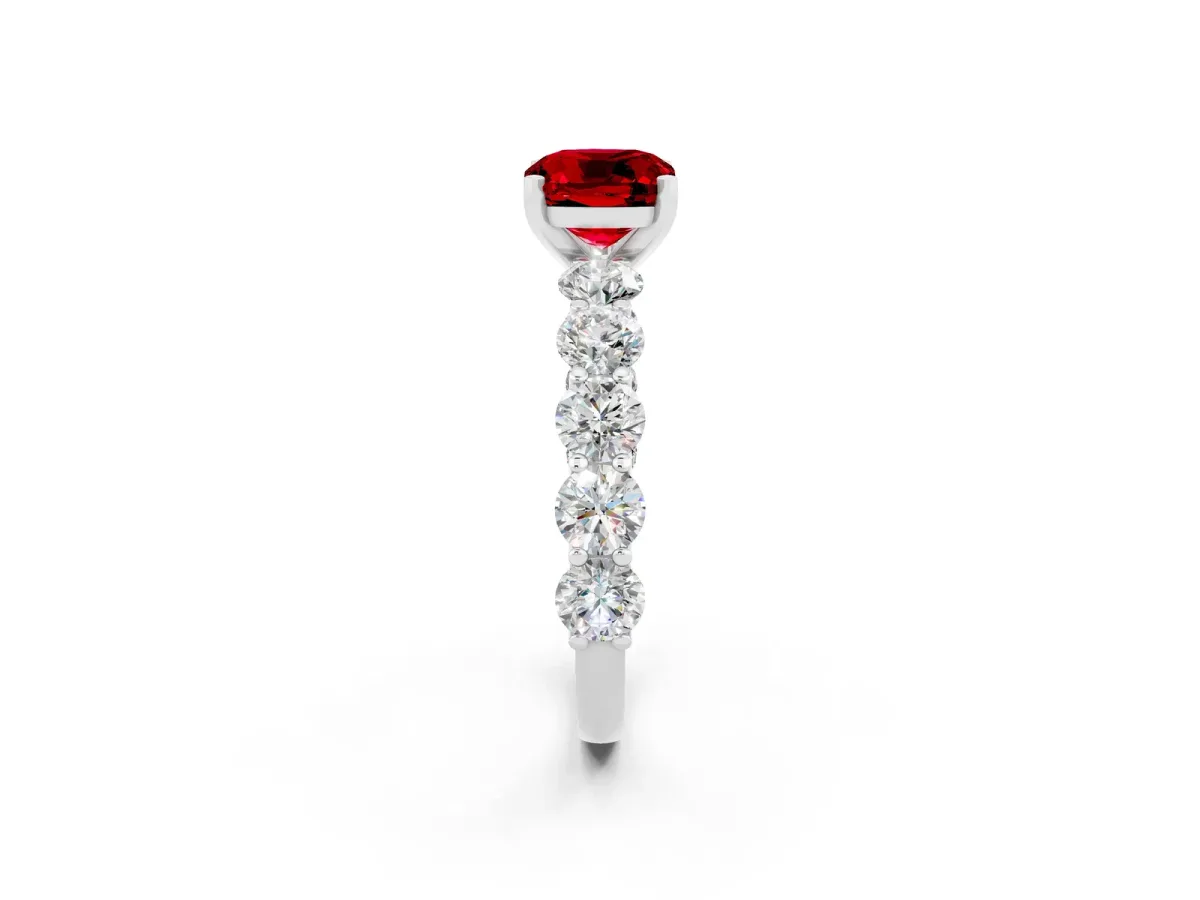 Cushion Cut Ruby Prong Setting with Side Stones on a Pave Band White gold
