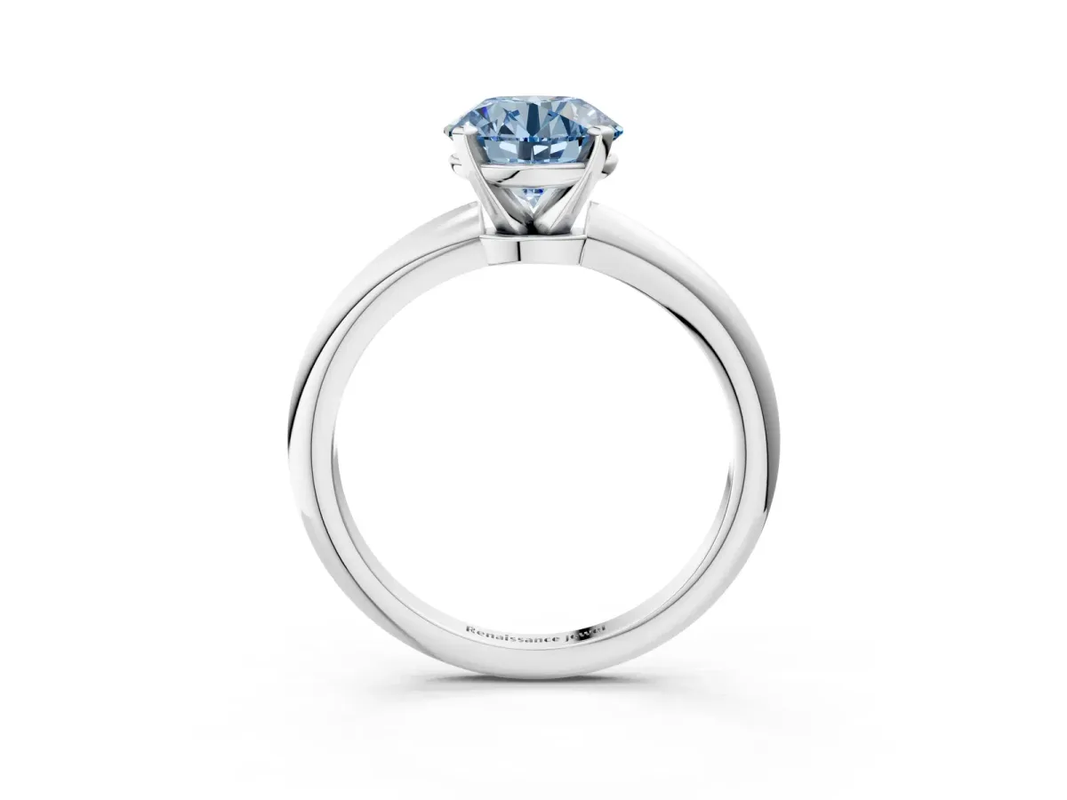 Fancy Blue Round Cut Diamond Solitaire Ring with Six-Prong Setting and Classic Band Platinum