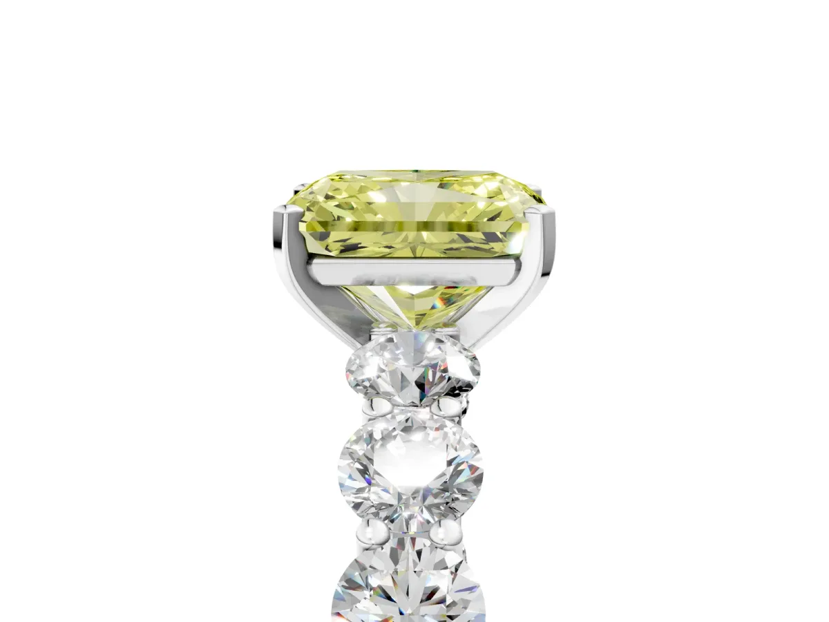 Fancy Yellow Radiant Cut Diamond Prong Setting with Side Stones on a Pave Band Silver