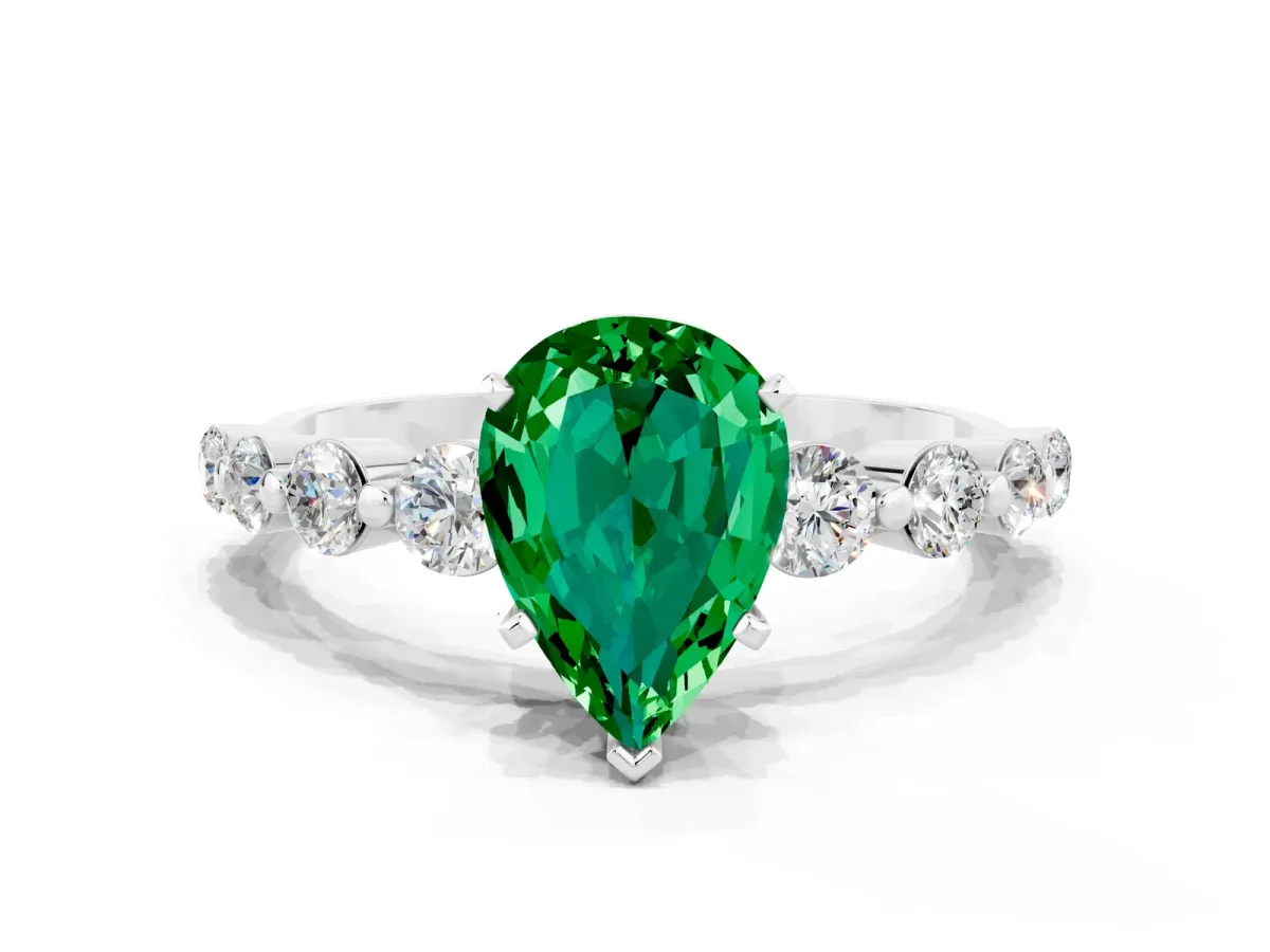 Pear Cut Solitaire Emerald Ring with Pave Band and Four-Prong Setting Silver