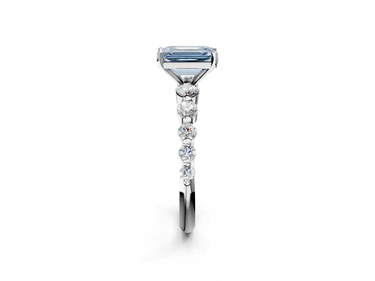 Fancy Blue Emerald Cut Solitaire Diamond Ring with Pave Band and Four-Prong Setting Silver