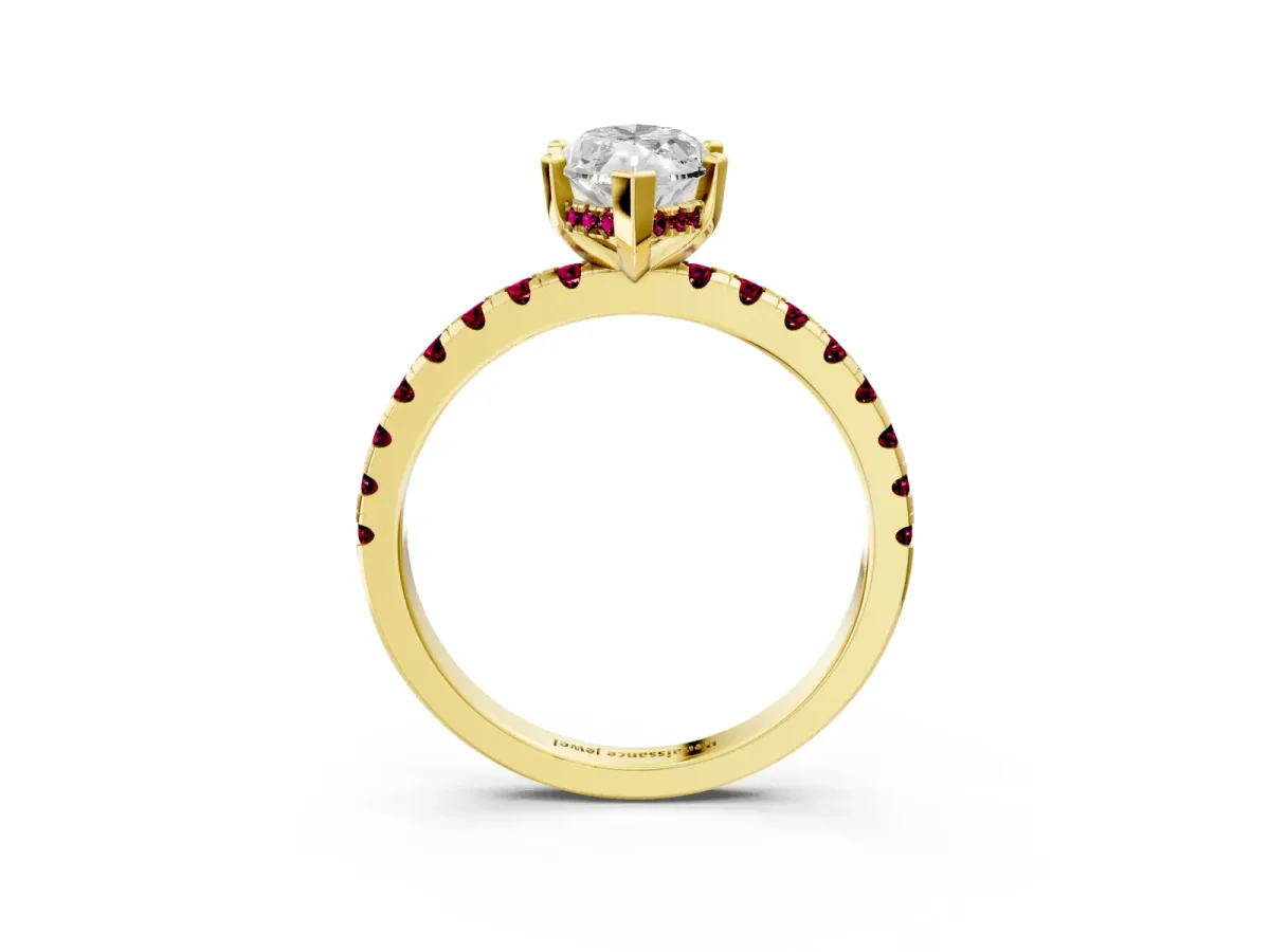 Marquise Cut Diamond Solitaire Ring with Round Garnet Pavé Band and Four-Prong Setting Yellow gold