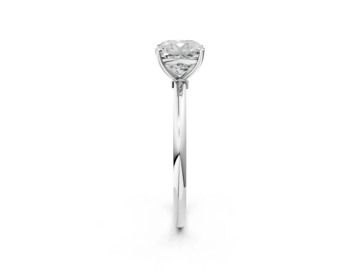 Cushion Cut Cut Solitaire Engagement Ring with Thin Band and Four-Prong Setting Silver