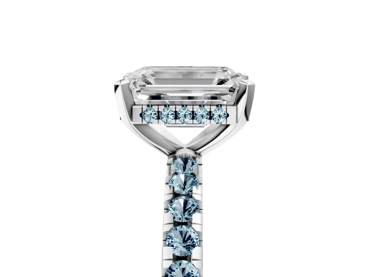 Emerald Cut Diamond Solitaire Ring with Round Aquamarine Pavé Band and Four-Prong Setting White gold