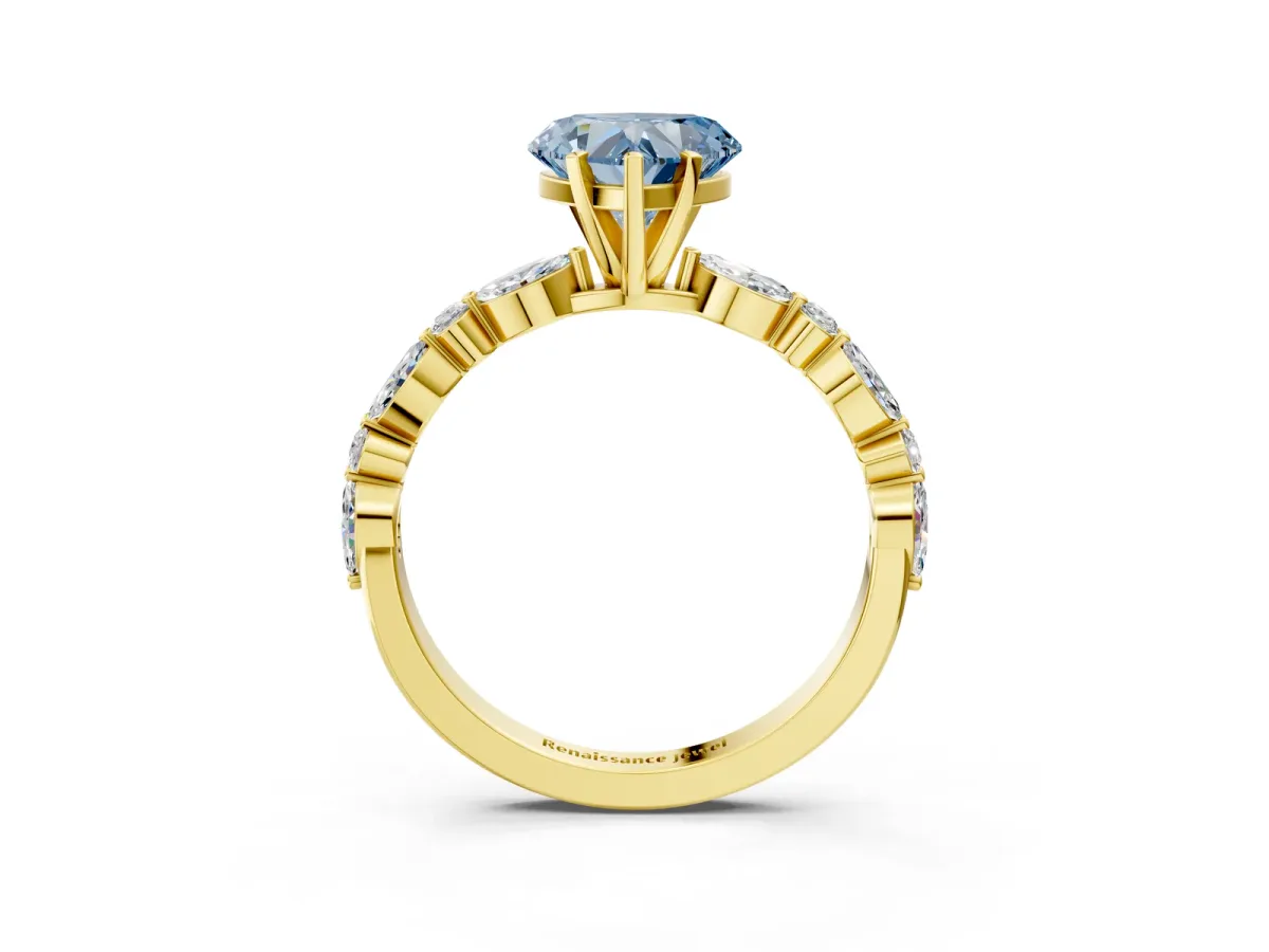 Fancy Blue Heart Cut Diamond Ring with Marquise and Round Side Stones and Four-Prong Setting Yellow gold