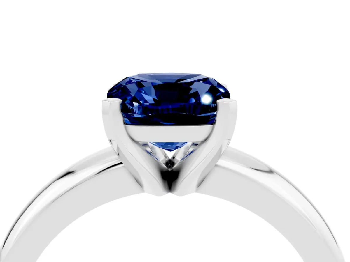 Cushion Cut Blue Sapphire Solitaire Engagement Ring with Round Band and Four-Prong Setting White gold