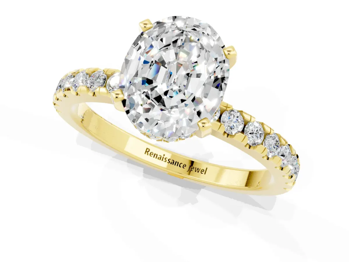 Oval Cut Moissanite Solitaire Ring with Round Pavé Band and Four-Prong Setting Yellow gold