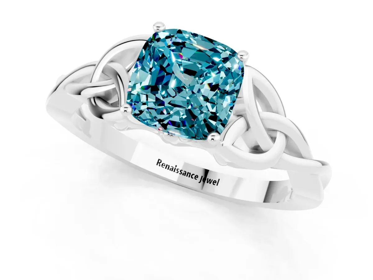Cushion Cut Blue Topaz Solitaire Engagement Ring with Celtic Knot Band and Four-Prong Setting White gold