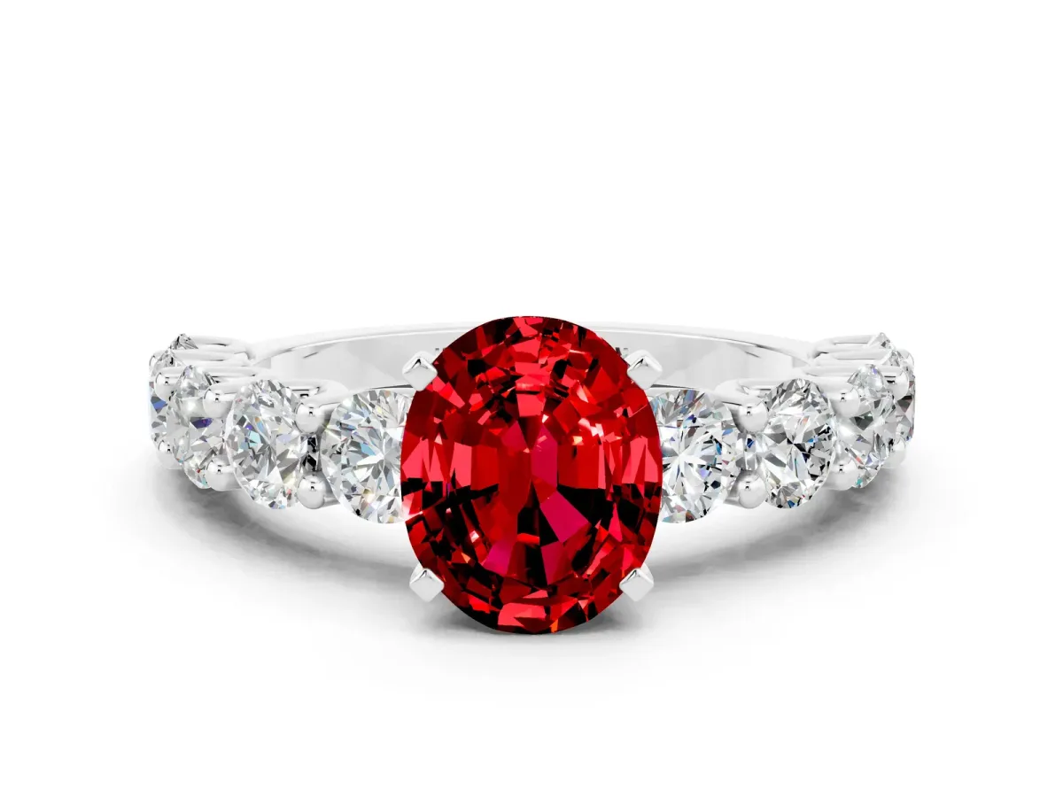 Oval Cut Ruby Prong Setting with Side Stones on a Pave Band Silver
