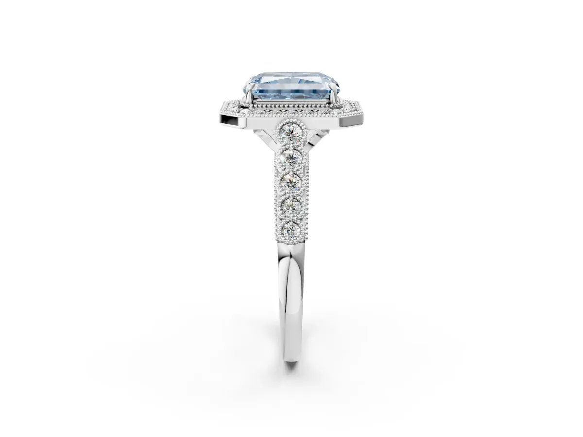 Fancy Blue Radiant Cut Halo Milgrain Solitaire with Bezel Set Side Stones and Pave Band Platinum