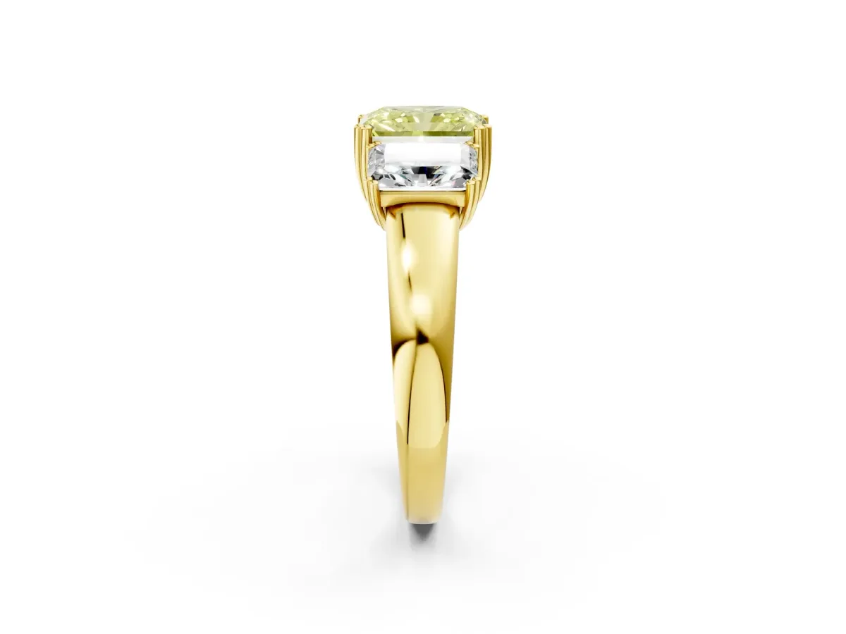 Fancy Yellow Three-Stone Radiant Cut Cut Diamond Ring with Channel Set Band and Four-Prong Setting Yellow gold