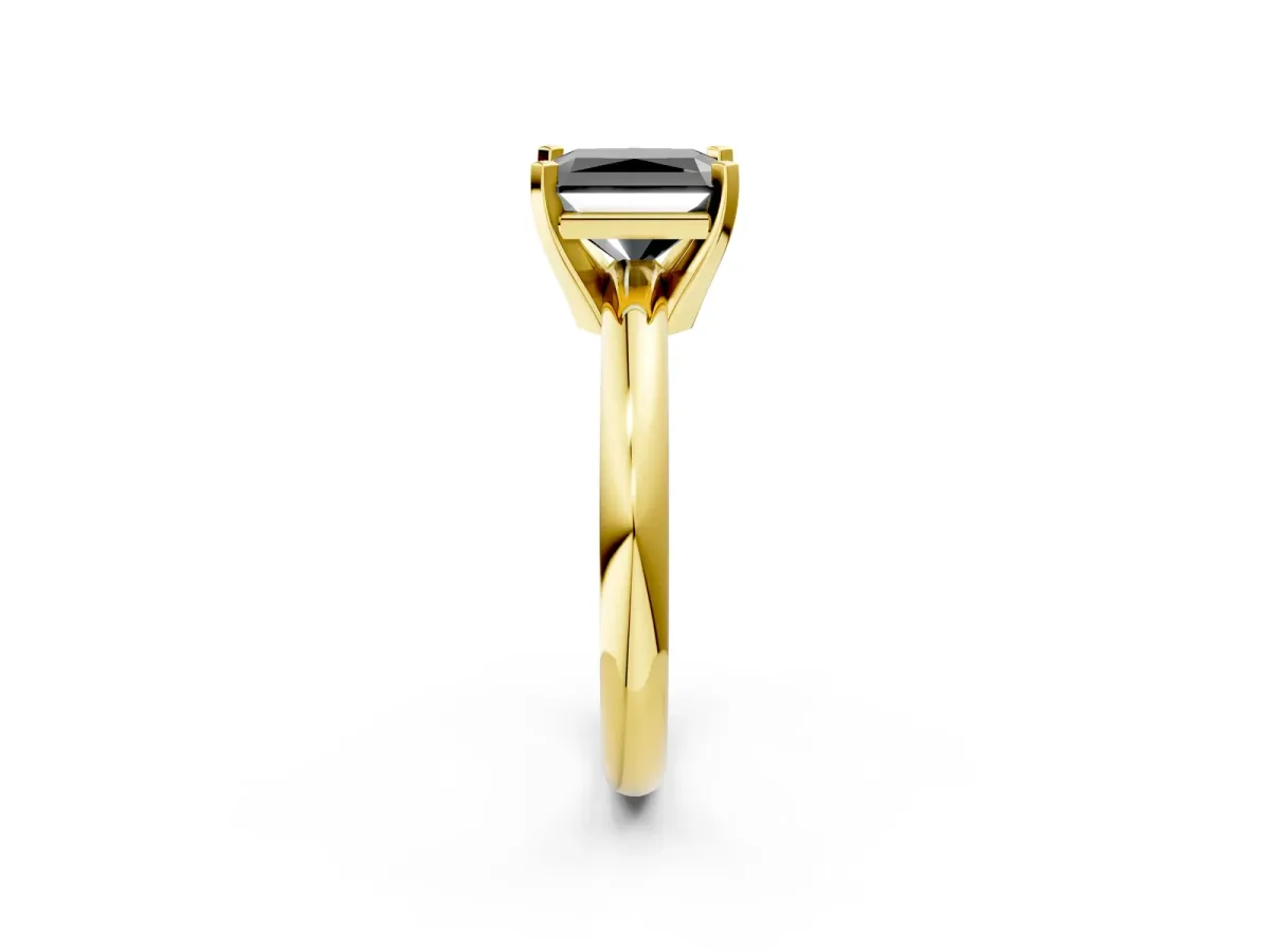 Fancy Black Radiant Cut Diamond Solitaire Engagement Ring with Round Band and Four-Prong Setting Yellow gold