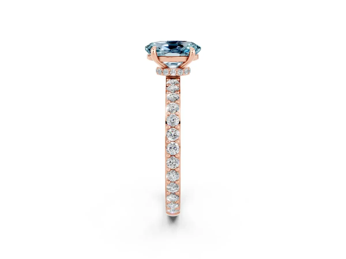Oval Cut Aquamarine Solitaire Engagement Ring with Pavé Band and Four-Prong Setting Rose gold