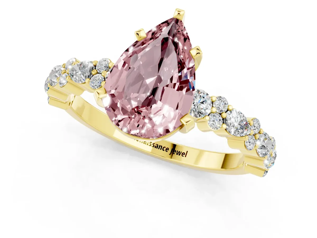Pear Cut Morganite Side Stone Solitaire Ring with Round and Four-Prong Setting Yellow gold