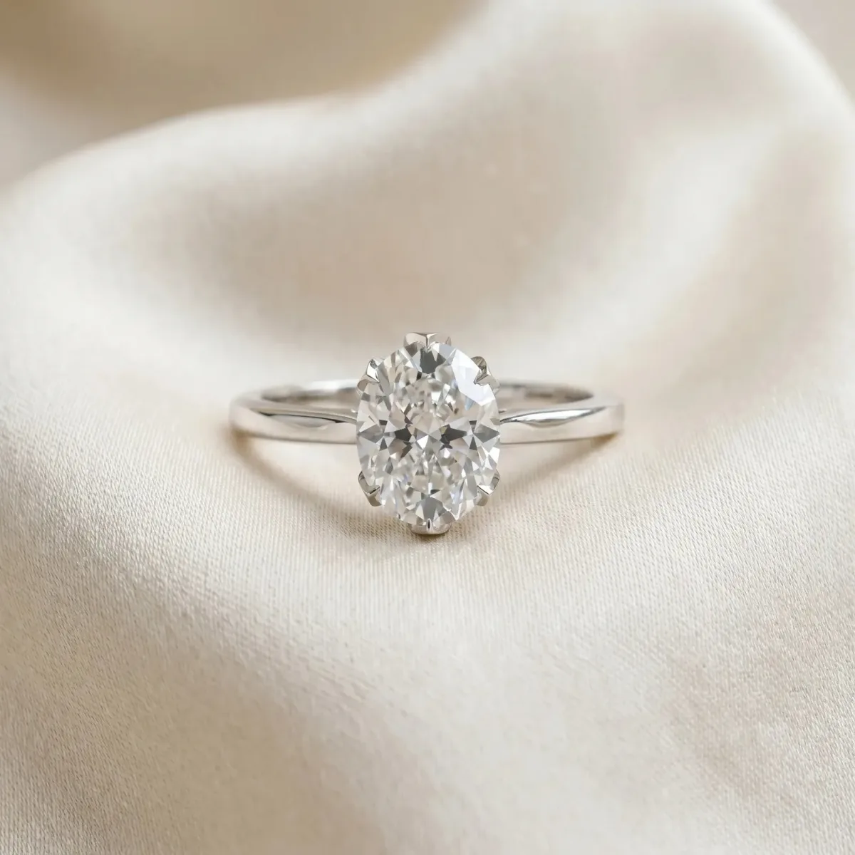 Oval Cut Diamond Solitaire Ring with Flower Prong Setting and Classic Band Silver