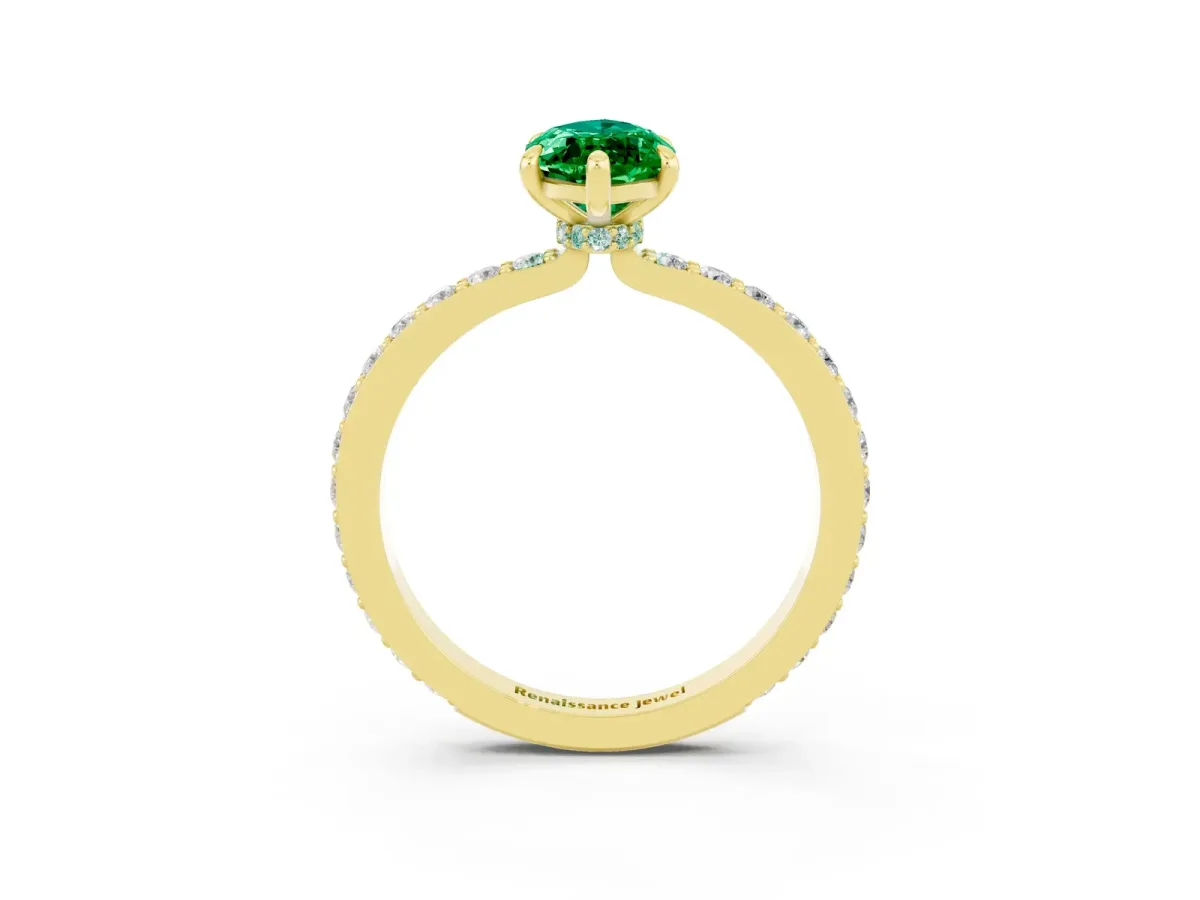 Marquise Cut Emerald Solitaire Engagement Ring with Pavé Band and Four-Prong Setting Yellow gold