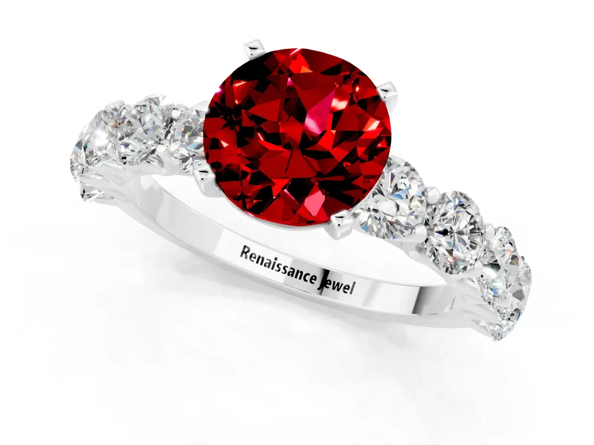 Round Cut Ruby Prong Setting with Side Stones on a Pave Band White gold