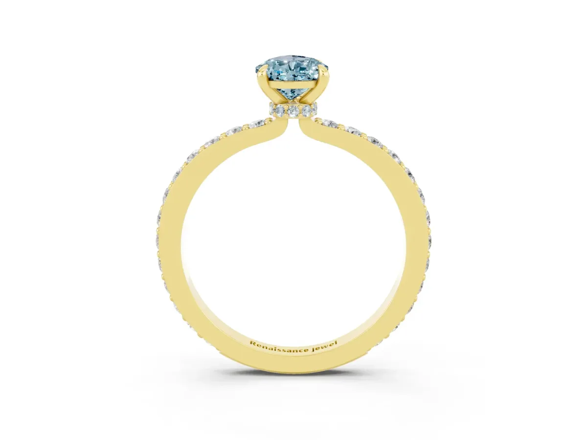 Pear Cut Aquamarine Solitaire Engagement Ring with Pavé Band and Four-Prong Setting Yellow gold