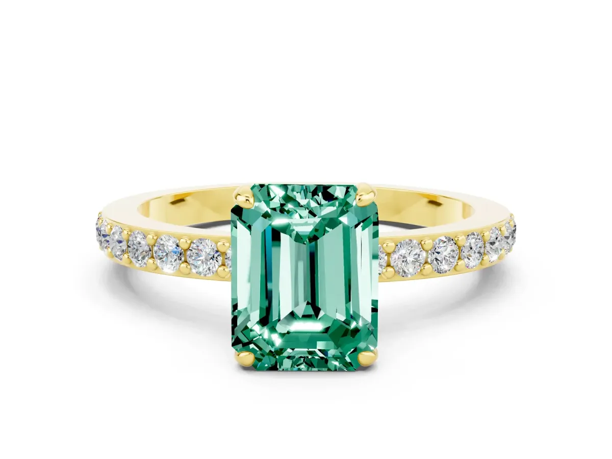 Emerald Cut Green Sapphire Solitaire Engagement Ring with Pavé Band and Four-Prong Setting Yellow gold