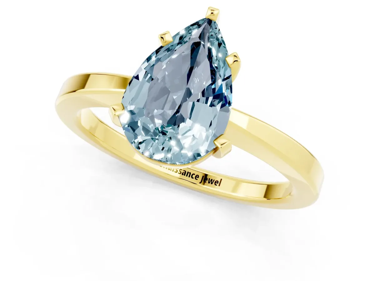 Pear Cut Aquamarine Solitaire Engagement Ring with Classic Band and Four-Prong Setting Yellow gold