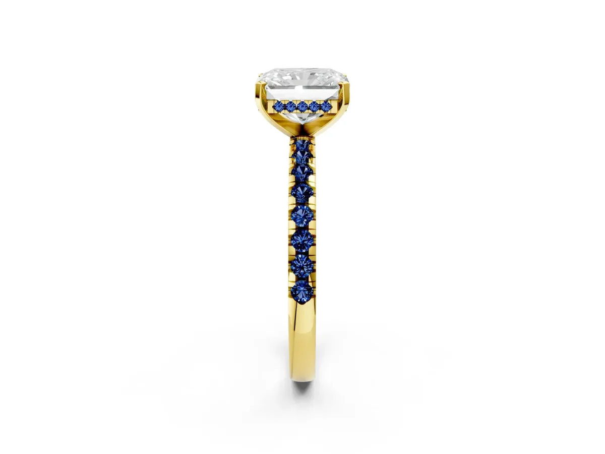 Radiant Cut Diamond Solitaire Ring with Round Blue Sapphire Pavé Band and Four-Prong Setting Yellow gold
