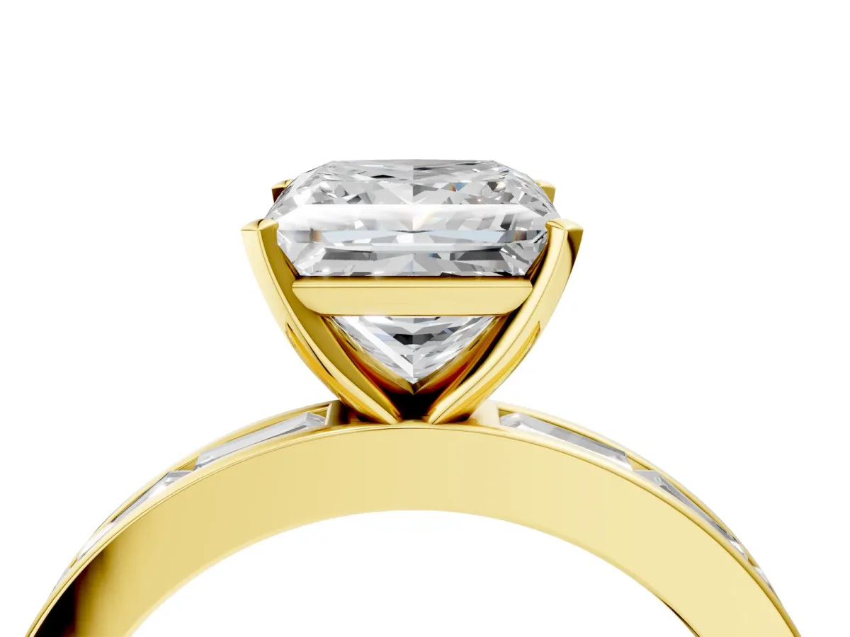 Princess Cut Solitaire Diamond Ring with Channel-Set Baguette Band and Four-Prong Setting Yellow gold