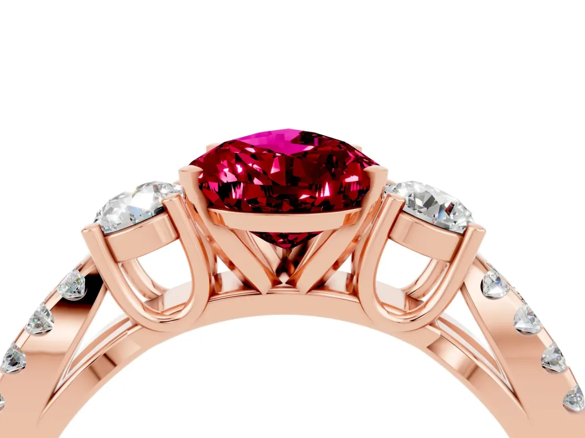 Pear Cut Garnet Three-Stone Ring with Pavé Split Shank and Four-Prong Setting Rose gold