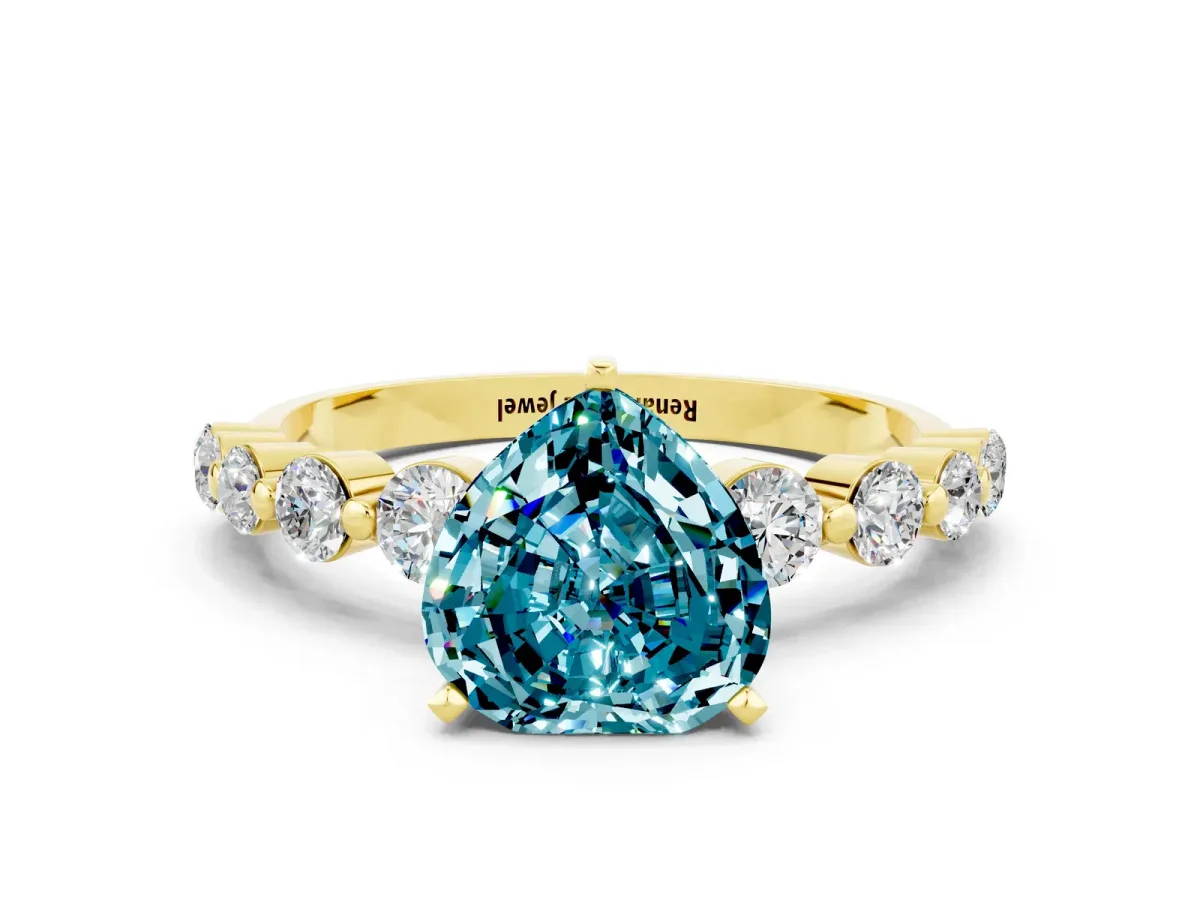 Heart Cut Solitaire Blue Topaz Ring with Pave Band and Four-Prong Setting Yellow gold