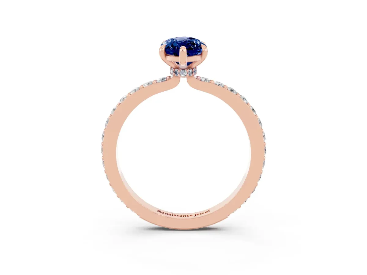 Marquise Cut Blue Sapphire Solitaire Engagement Ring with Pavé Band and Four-Prong Setting Rose gold