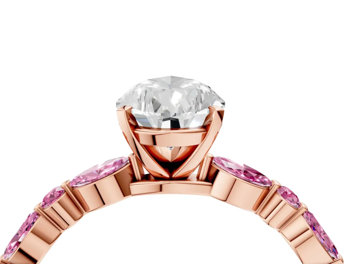 Pear Cut Diamond Ring with Marquise and Round Pink Sapphire Side Stones and Four-Prong Setting Rose gold