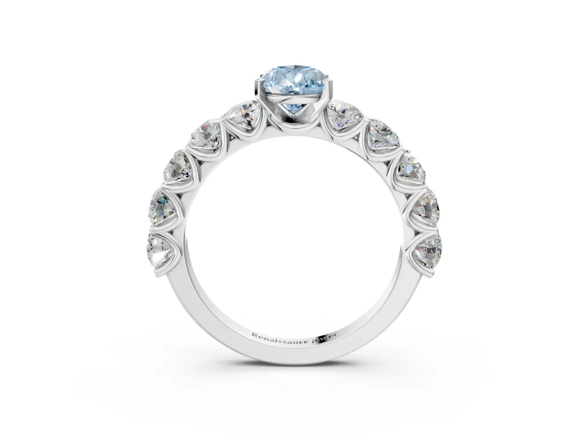 Fancy Blue Pear Cut Diamond Prong Setting with Side Stones on a Pave Band Silver
