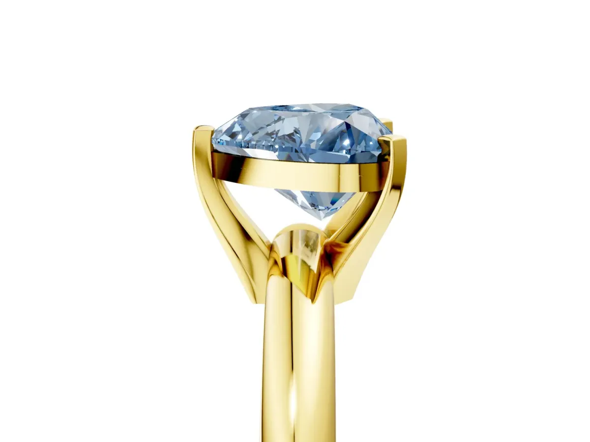 Fancy Blue Heart Cut Diamond Solitaire Engagement Ring with Round Band and Four-Prong Setting Yellow gold