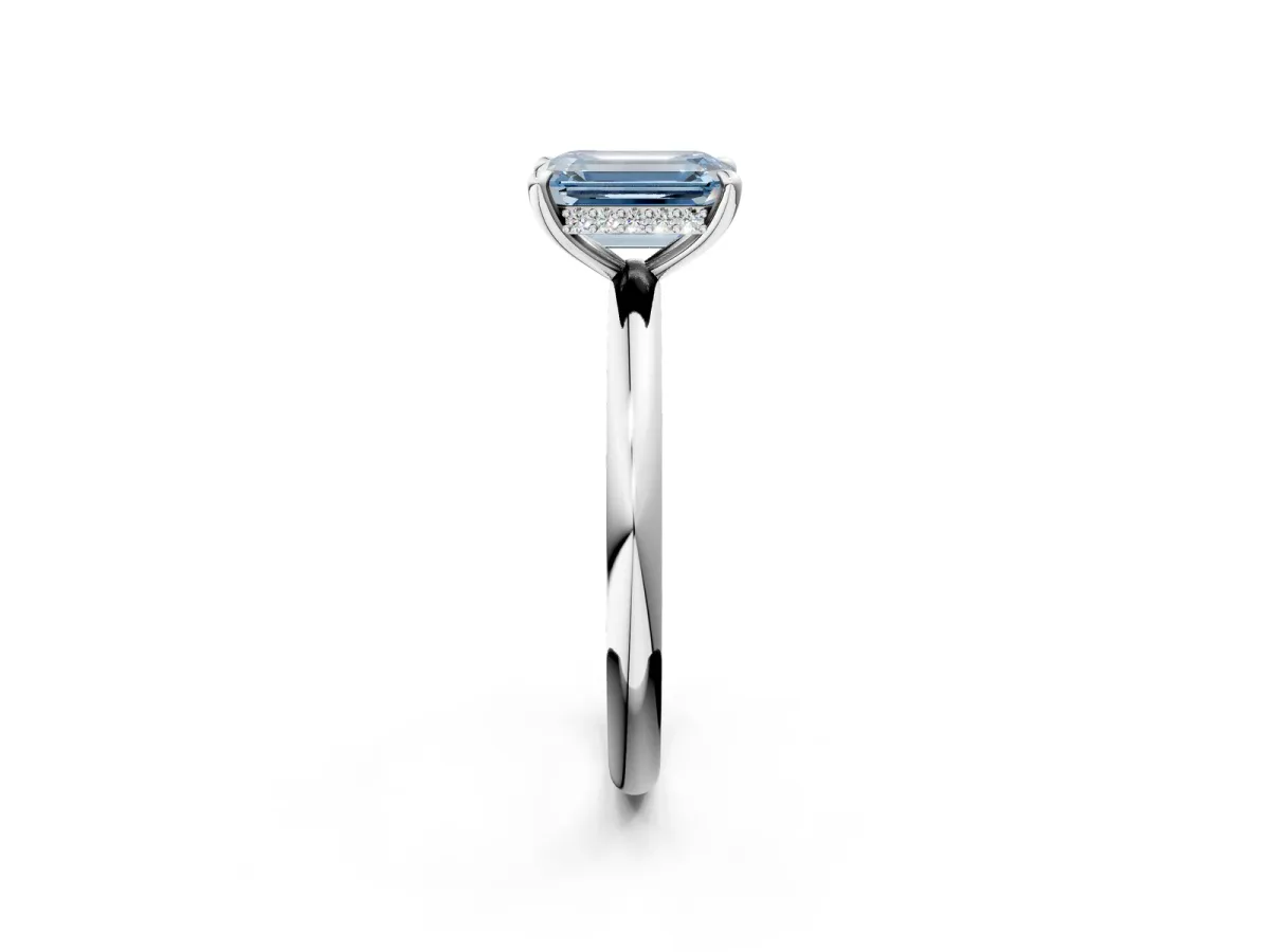 Fancy Blue Emerald Cut Diamond Solitaire Ring with Thin Band and Four-Prong Setting Platinum