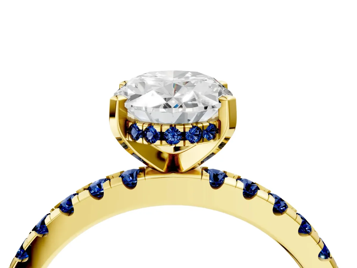 Oval Cut Diamond Solitaire Ring with Round Blue Sapphire Pavé Band and Four-Prong Setting Yellow gold