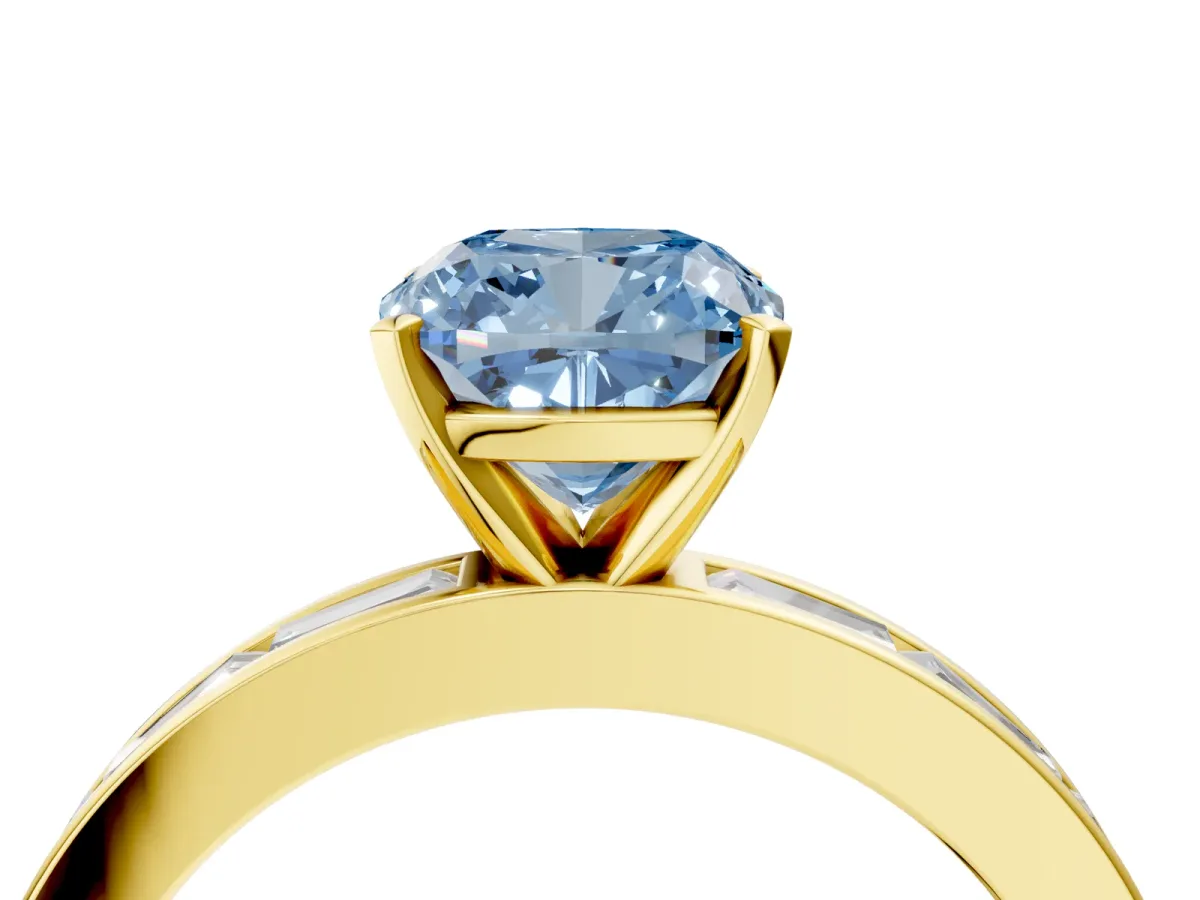 Fancy Blue Cushion Cut Solitaire Diamond Ring with Channel-Set Baguette Band and Four-Prong Setting Yellow gold