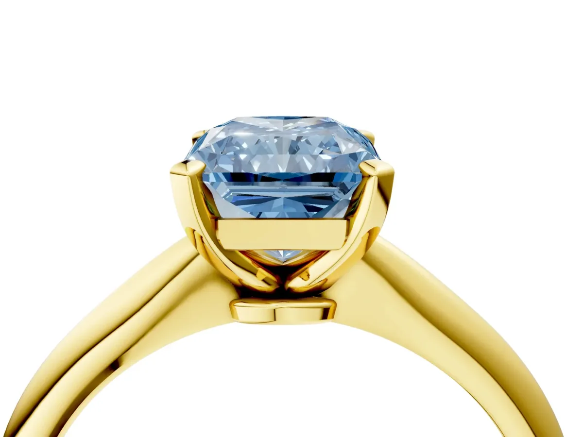 Fancy Blue Radiant Cut Diamond Solitaire Engagement Ring with Classic Band and Four-Prong Setting Yellow gold