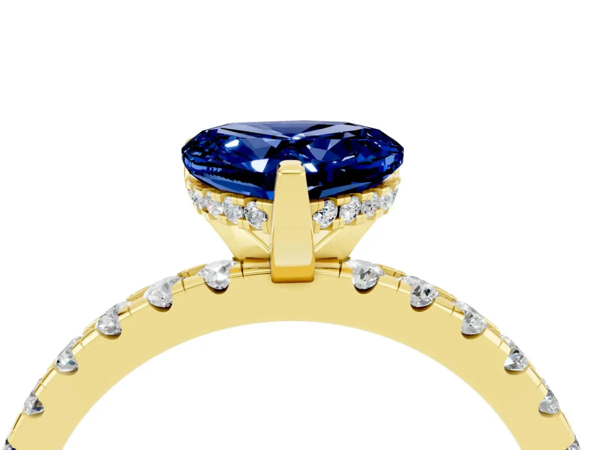 Heart Cut Blue Sapphire Solitaire Ring with Round Pavé Band and Four-Prong Setting Yellow gold