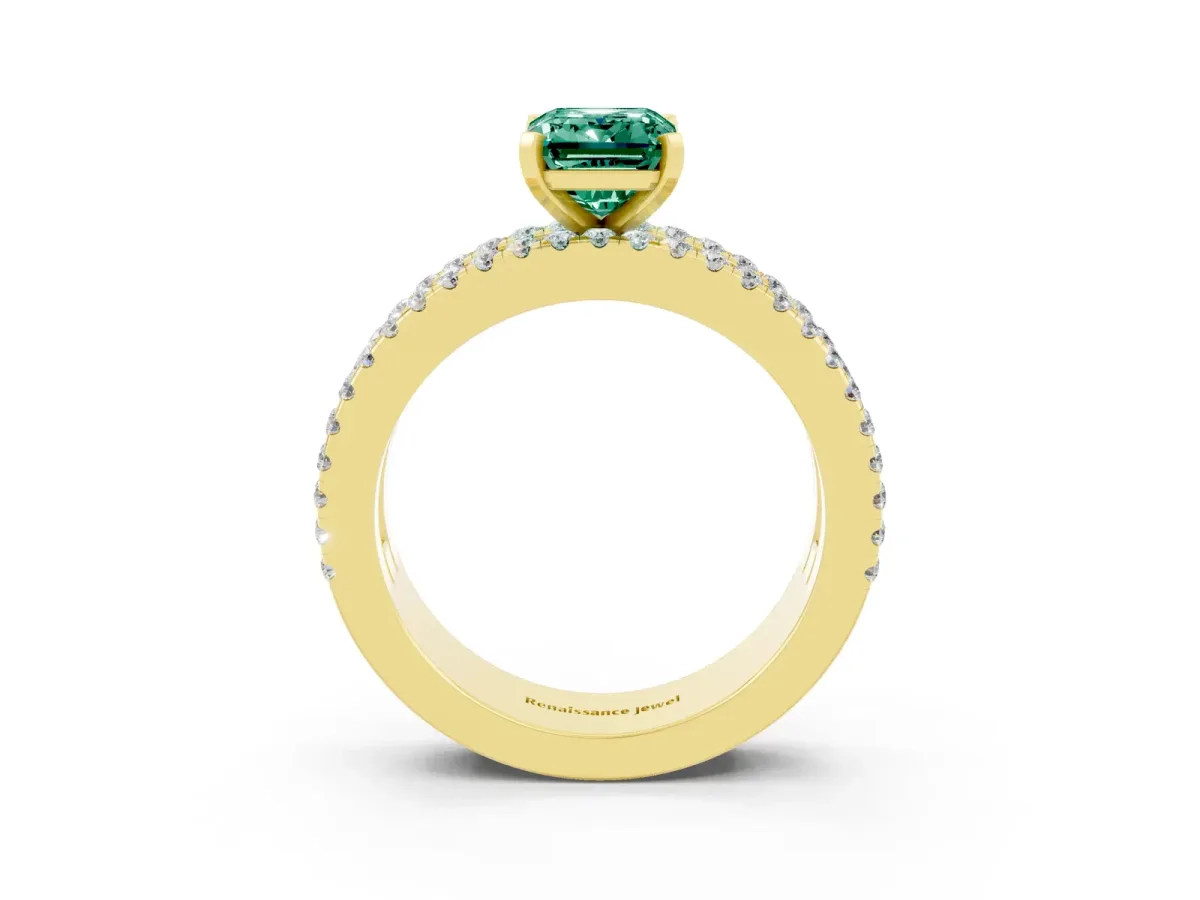 Emerald Cut Green Sapphire Solitaire Ring with Pavé and Channel Set Band Yellow gold